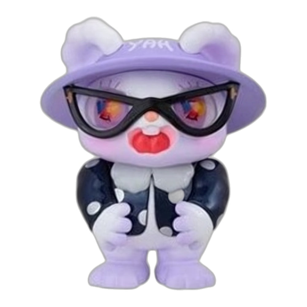 Purple bear character figurine wearing black sunglasses and a dark jacket