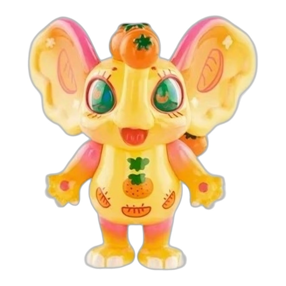 Cartoon bunny figurine with yellow fur, orange carrot on head, and green eyes