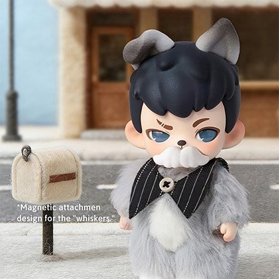 Blue-gray puppy boy blind box figure in fuzzy gray outfit with white paw accents
