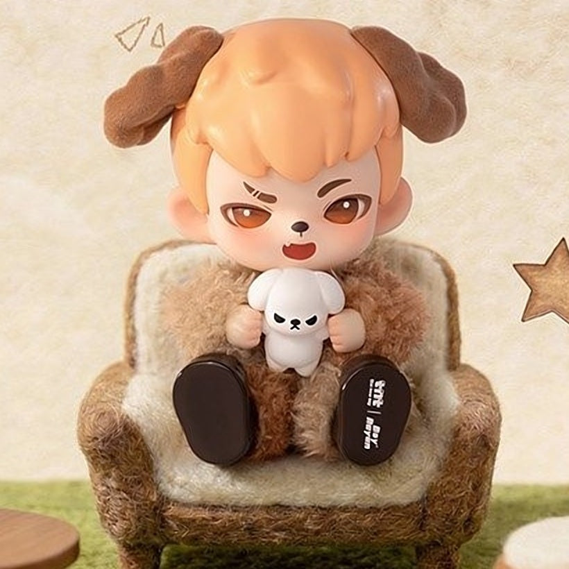 Brown and tan puppy boy blind box figure holding a small white puppy plush