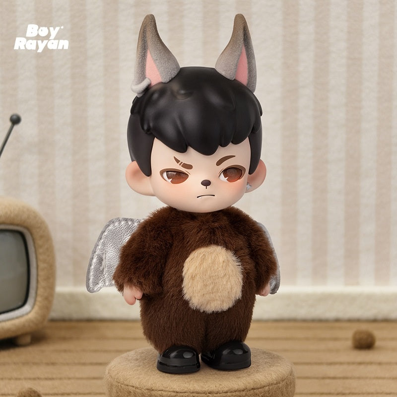 Black-haired puppy boy blind box figure in brown plush jacket with white chest patch