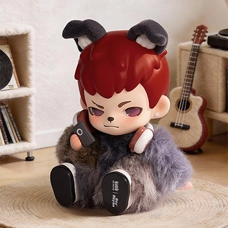 Red-haired puppy boy blind box figure lying down holding a small white puppy plush