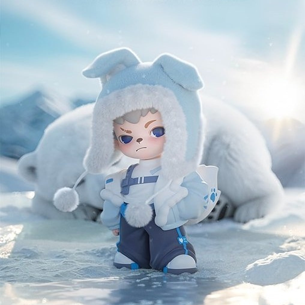Blind box action figure in a gray hooded winter suit, holding a blue device