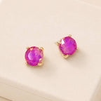 Sterling silver post round glass stud earrings with pink-purple gemstone-style center