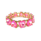 Neon fuchsia crystal bead stretch bracelet with heart-shaped stones and gold-tone links