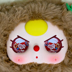 Plush kids backpack front face with yellow eye and red patterned eye details