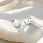 Round glass stud earrings with opal-blue iridescent stone and gold-tone S925 posts