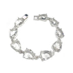 Teardrop crystal linked chain bracelet with clear stones and silver-tone setting