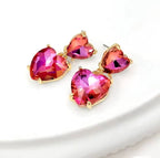 Fuchsia gradient heart crystal dangle earrings with stacked faceted stones and gold-tone hooks
