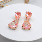 Teardrop stud-and-dangle earrings with peach faceted stones and gold-tone settings