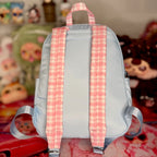 Kids backpack back view with pink gingham straps and adjustable buckles