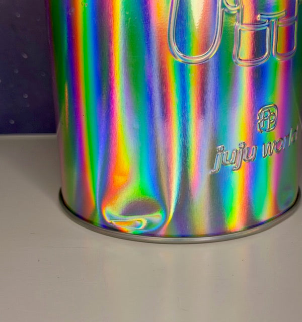 Holographic silver tin side with “Juju world” logo and curved embossed markings