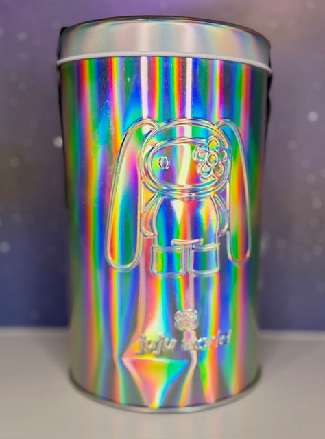 Holographic metal tin with bear graphic and small hanging charm detail