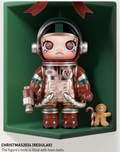 Astronaut-themed vinyl figure with red suit, round helmet, candy cane accessory