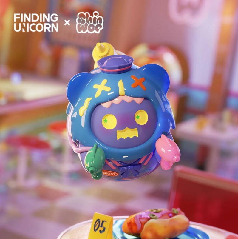 Blue ghost diner vinyl figure with yellow face markings and small green drink