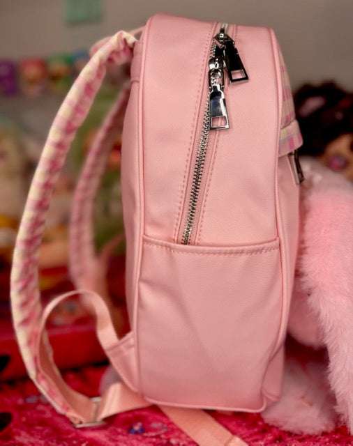 Pink plush bunny backpack with front zipper and hanging strap