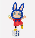 Rabbit-themed chibi figurine with blue hood, red dress, yellow shoes, on cube base