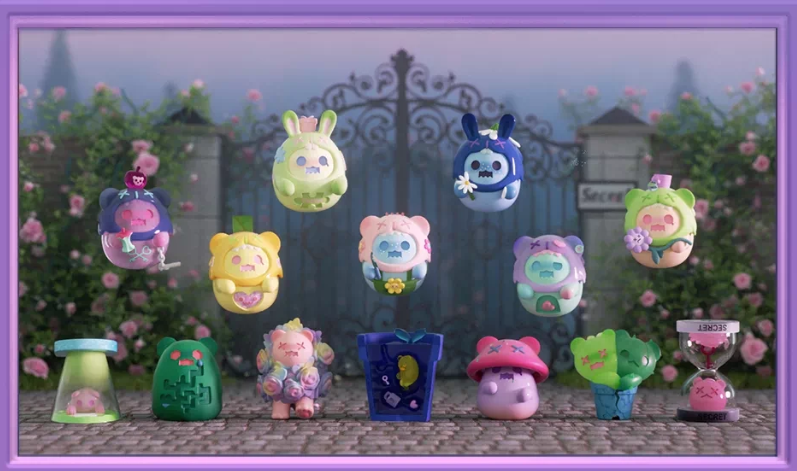Boxed display of multiple cute mini bear and bunny figures on a backdrop