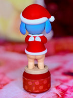 Sonny Angel Christmas mini figurine in red Santa outfit with white trim on round base