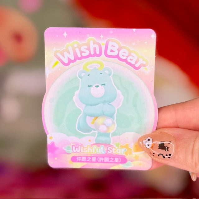 Wish Bear product card with pastel artwork and a clear character-shaped accessory