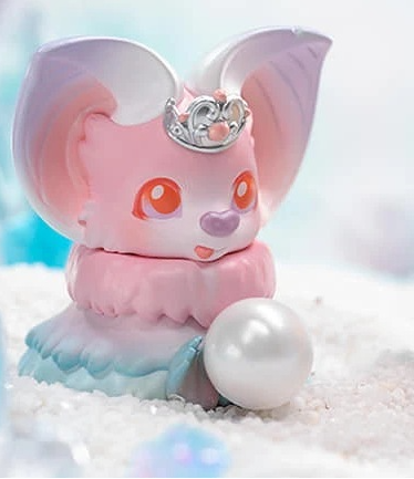 Pink winged collectible figure with tiara, seated on a white base, holding a white sphere