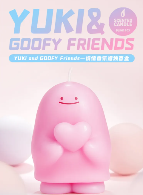 Pink character-shaped scented candle holding a heart, with wick