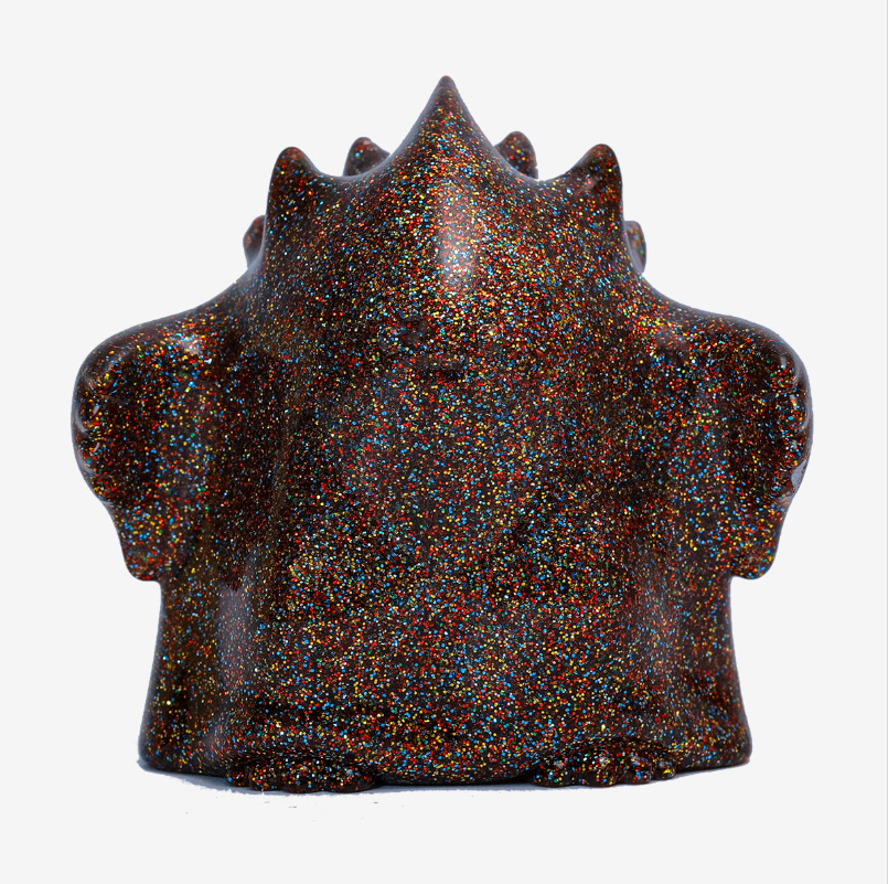 YUKI Evolution Series figure, black glitter body with orange-gold shimmer