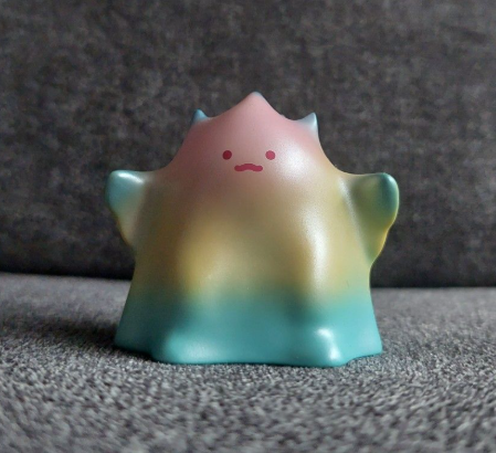 POP MART YUKI Interfusion Series figure in teal and green gradient with smile face